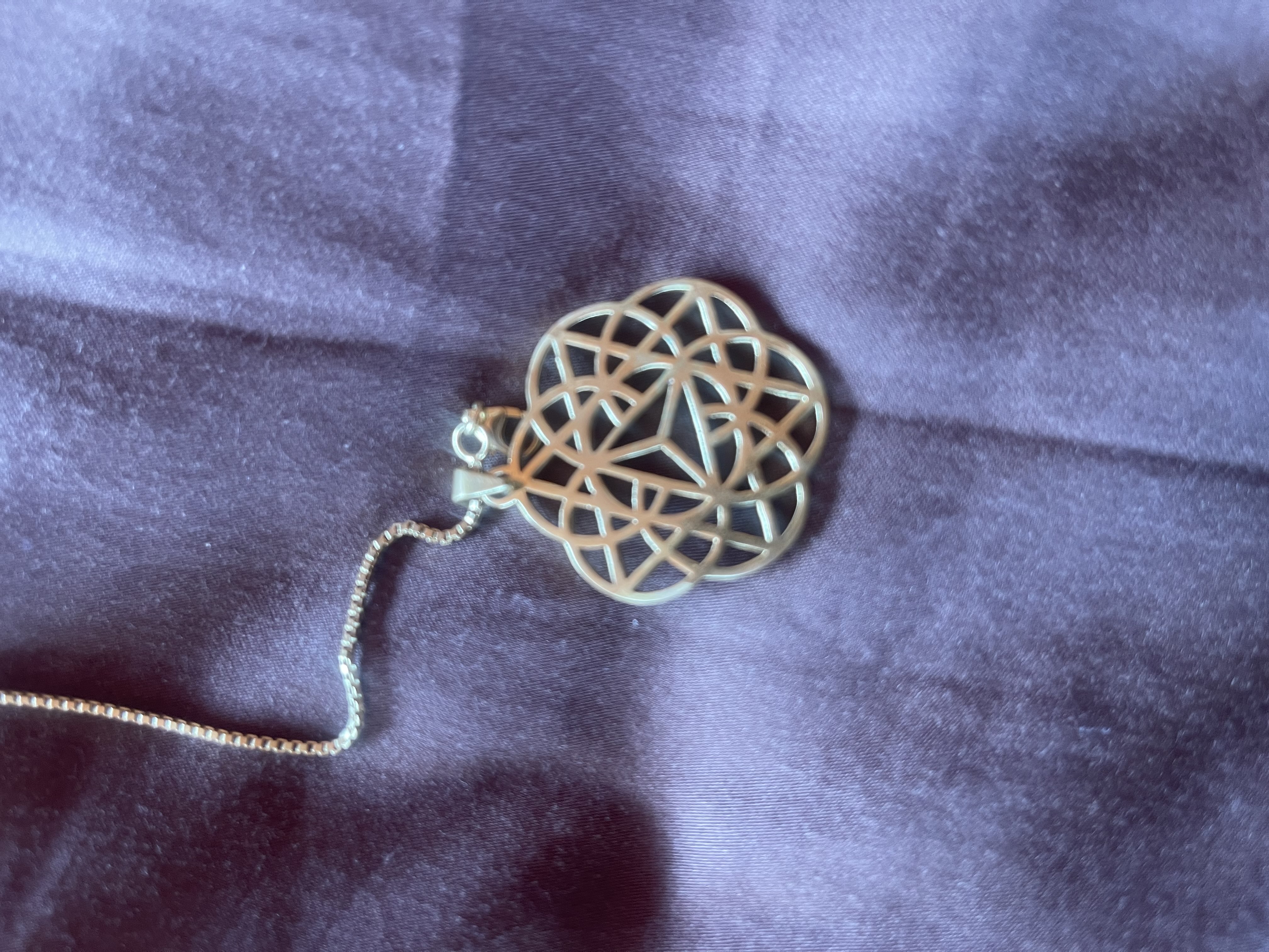 The Activator Key pendant — sacred geometry in 18K gold